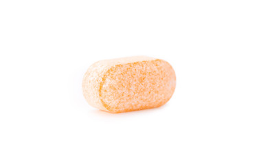 Vitamin C tablet isolated on white background