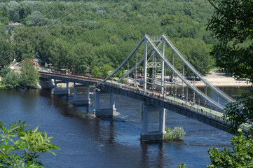 View of Dnieper river, Pedestrian bridge and a part of Truhanov island. Kiev, Ukraine