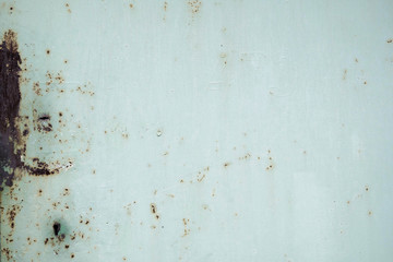 Iron wall with dark brown rust. Corroded metal. Background for design 