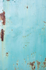 Iron wall with dark brown rust. Corroded metal. Background for design 