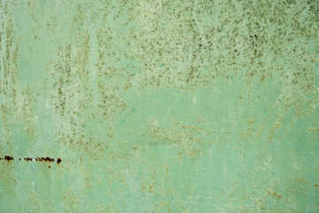 Iron wall with dark brown rust. Corroded metal. Background for design 