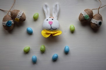Easter eggs on a white wooden background. Easter background. 