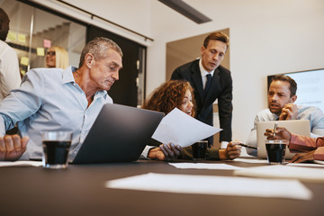 Diverse businesspeople having a meeting in an office boardroom