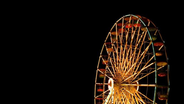 Amusement park, Ferris wheel at night.