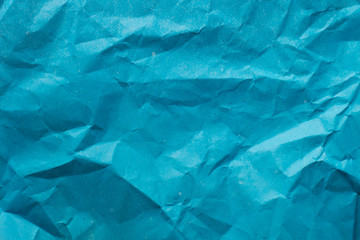 texture of parchment mashed paper. blue background