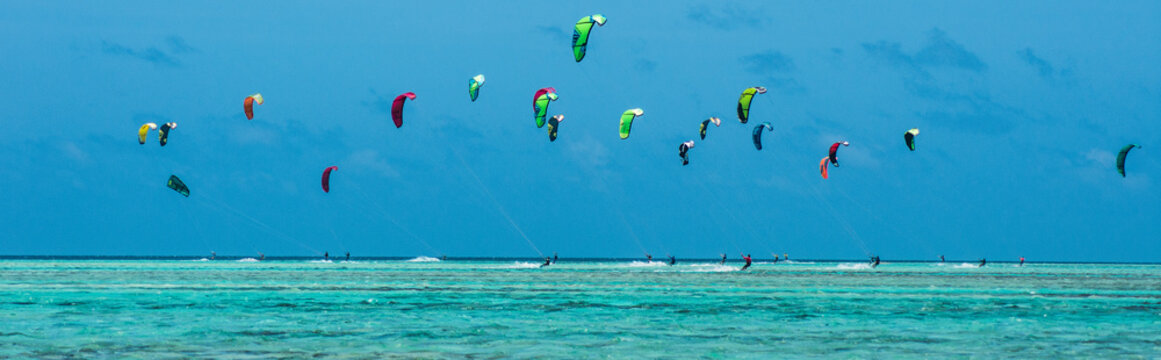 People practicing kitesurfing on a beautiful summer day - Caribbean - Archipelago of Los Roques - Venezuela