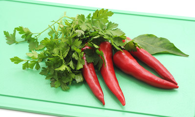 Red pepper on the board.