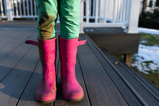 Muddy rain boots