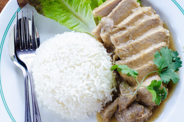 Roasted Pork Rice with Green Vegetables White dish in the morning restaurant.