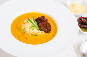 Delicious spicy pumpkin soup with parmesan.
