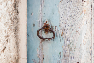 old weathered wooden knocker door