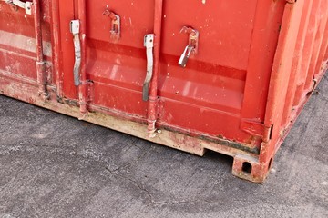 A close up shot of a red shipping storage container. Logistics concept image. 