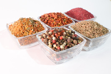 Different spices on the white background