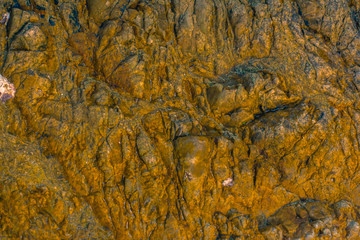 Rocky beach background from Phuket Thailand
