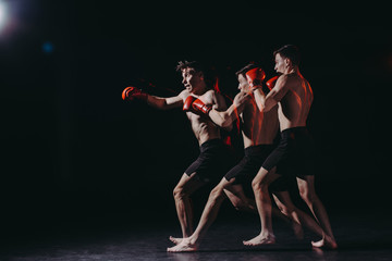 sequence shot of handsome shirtless muscular boxer in boxing gloves doing punch