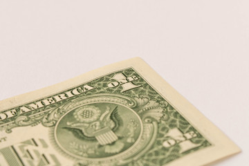 1 dollar bill on a white background . Close up. The concept of saving money.