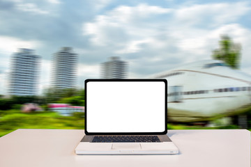 laptop on background of blue sky