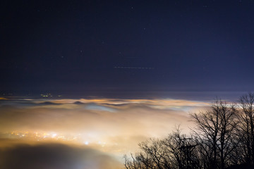 Fototapeta na wymiar Fog above city