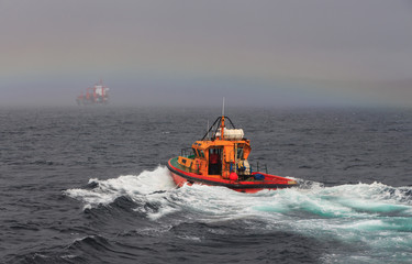 pilot boat on the sea waves