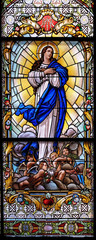 Obraz premium Virgin Mary, stained glass window in the Parish Church of the Visitation of the Virgin Mary in Zagreb, Croatia 