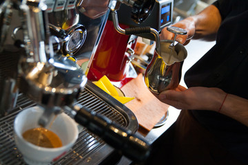 barista making hot milk