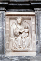 Fototapeta na wymiar Virgin Mary with baby Jesus, altar in Franciscan church of the Friars Minor in Dubrovnik, Croatia 