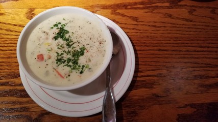 Fish/Clam Chowder Soup Bowl, Top View on Rustic Wood