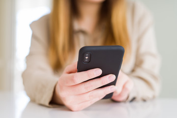 Close up of woman using smartphone