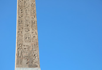 Egyptian obelisk with many symbols called hieroglyphics that wer