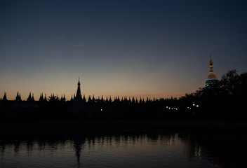 Silhouette of line-up pagodas, Mandalay, Myanmar.