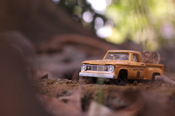 yellow and black car scale model