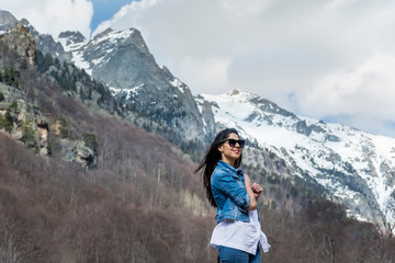 Naklejka na ściany i meble Beautiful Young Woman with Sunglasses Outdoor Travelling in the Mountain 