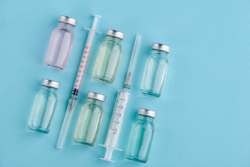 Vaccine vials and syringes