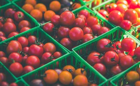 red tomatoes in baskets