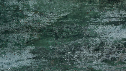 background of green ragged rusty weathered metal surface