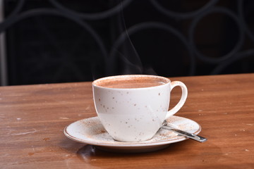  smoke on top of coffee in cup