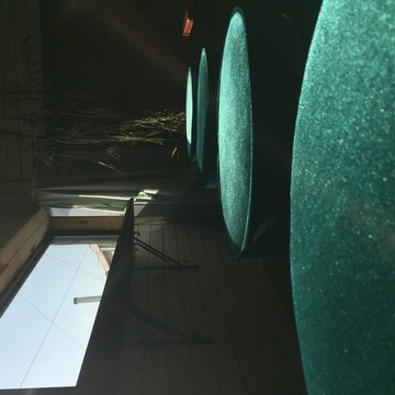 four round green ottoman chairs