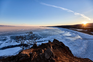 Sacred rocks Shamanka on the Olkhon island. Winter dawn. Baikal, Russia