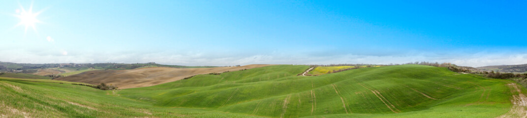 Spring background of table and Tuscany landscape 