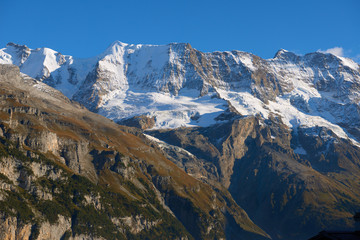 View of the mountains panorama at sunset from Murren in Switzerland.