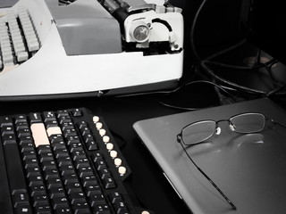 old typewriter and keyboard computer