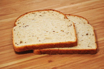 Two Slices of Fresh Rye Bread on White 