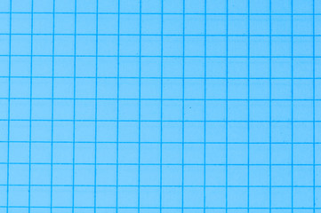 Blank paper sheet of a notebook. Grid. Blue. Background