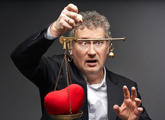 business man listen heart weigh heart