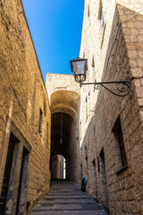 Narrow street in Castel dell'Ovo in Naples