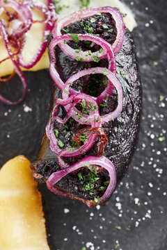 Black blood pudding with mashed potatoes Mousseline and caramelized apple