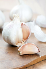 Garlics on wooden board