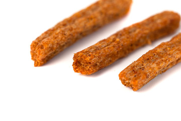 Croutons of toasted bread on white background