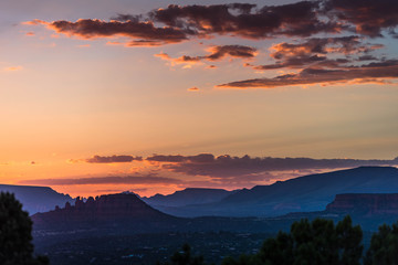 Sunset wiith purples and pinks with clouds