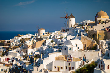 Fototapeta premium Santorini in Greece in summer hot sunset weather